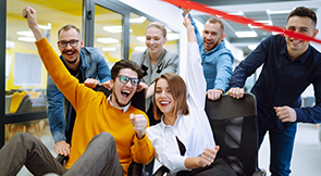 A game of musical office chairs is a fun fundraising ideas to bring to the workplace.